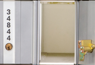 Image of the Extra Small PO Box, Size 1, seen open and empty.
